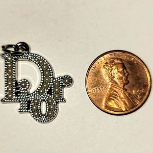 Dior zipper pull charm